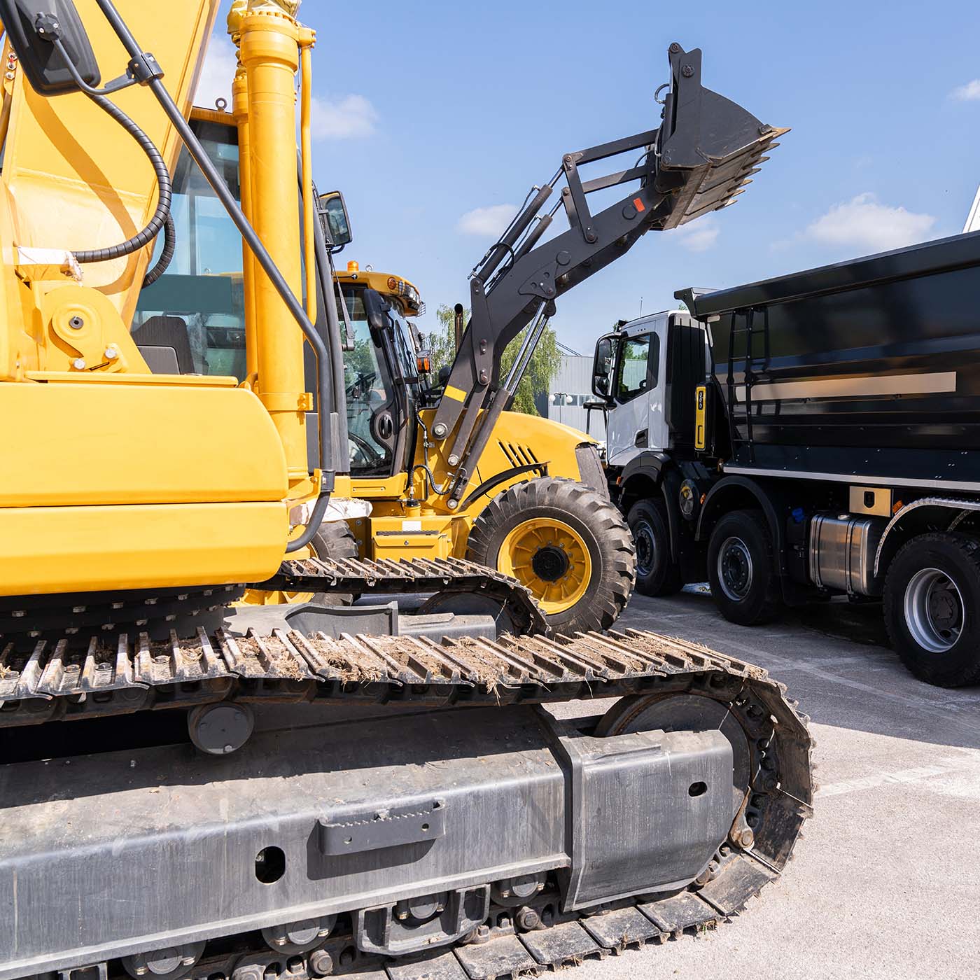 Heavy construction machines at work. Heavy construction machines at work.