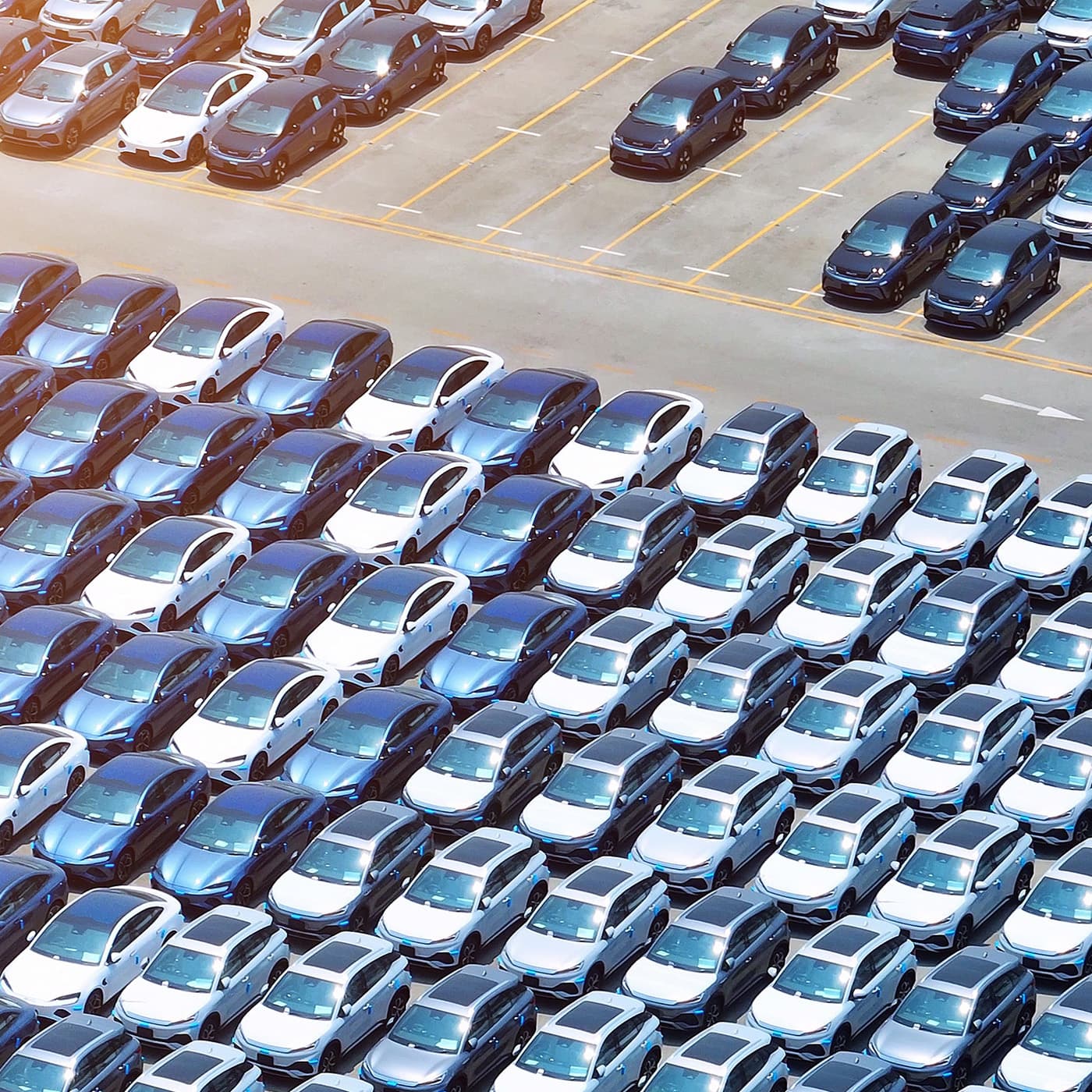 Overhead photo of a large fleet in a parking lot. Overhead photo of a large fleet in a parking lot.