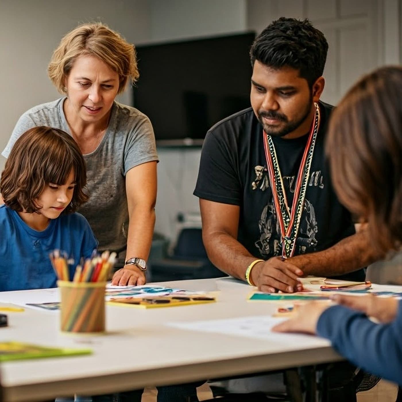 A community centre in Australia, where a diverse group of people are interacting warmly. A community centre in Australia, where a diverse group of people are interacting warmly.
