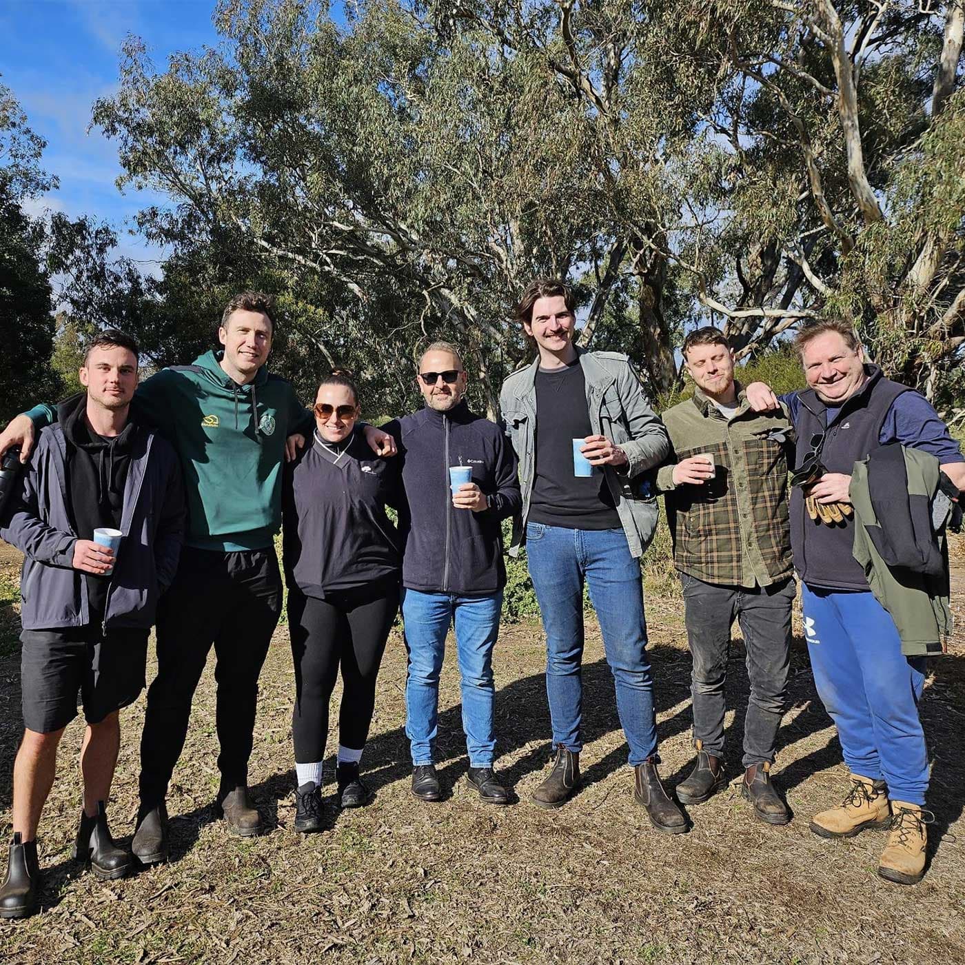 A group of happy Custom Fleet team members volunteering for Werribee River Association. A group of happy Custom Fleet team members volunteering for Werribee River Association.