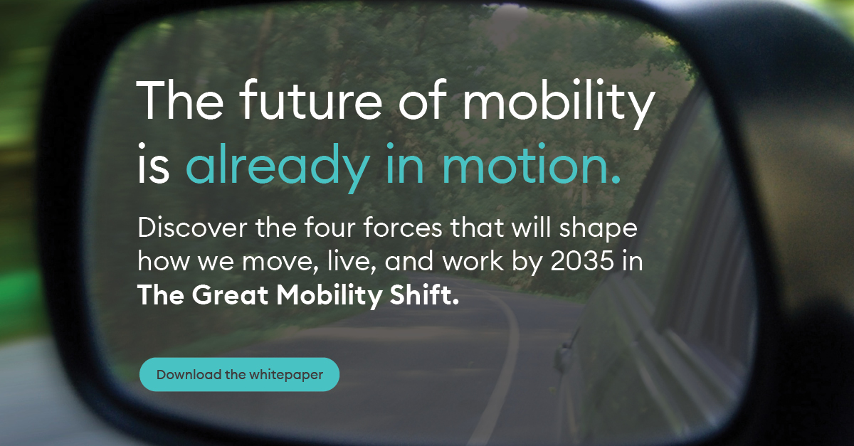 A close up of a rear view mirror of a vehicle. The words 'Objects in the future may be closer than they appear', with a futuristic looking car in the mirror.