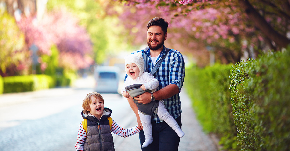 Father, child and baby